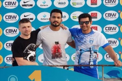 بیچ ریسلنگ میں سلور میڈل حاصل کرنے والے انعام بٹ وطن واپس پہنچ گئے